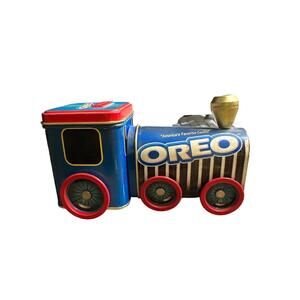 This is a vintage early 2000’s late 1990’s Oreo Train coin piggy bank Tin it’s b